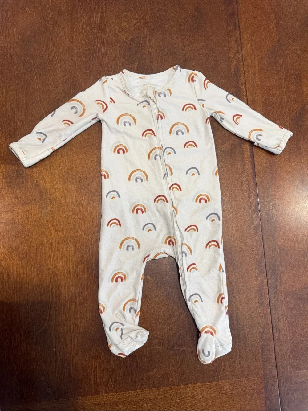 Caden Lane Cream Footed One-Piece with Rainbow Print